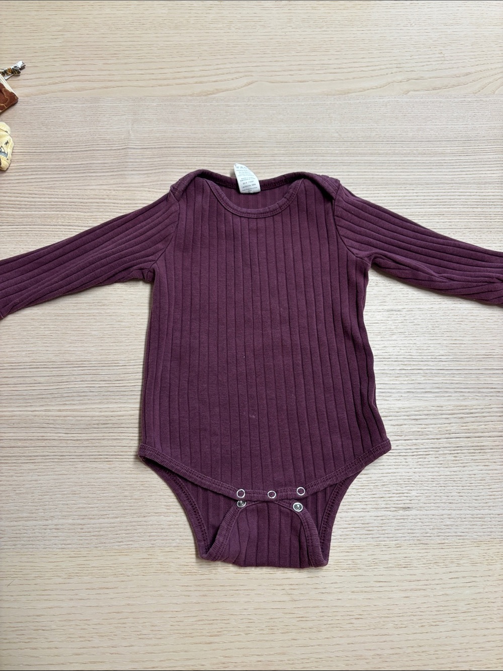 kate quinn Long-Sleeve Ribbed One-Piece Bodysuit in Plum